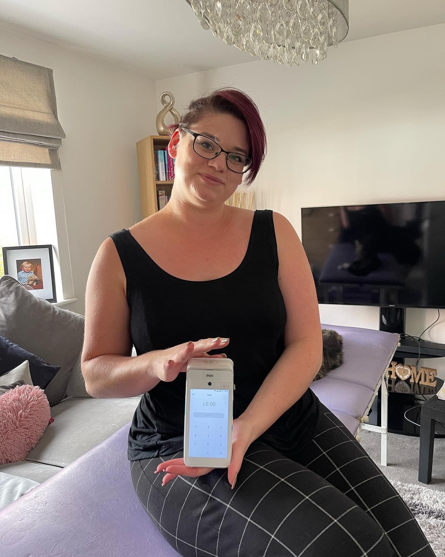 A card terminal on the desk of a small home-based business